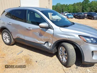 2020 Ford Escape SE with VIN 1FMCU0G6XLUC54979, listed as a IAAI auction lot 42223043 with 52,770 mi miles and . Bid and sale history available at DreamBid. Image 6.