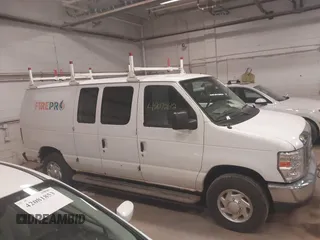 2012 Ford Econoline Cargo Recreational with VIN 1FTNE2EW4CDB03757, listed as a IAAI auction lot 42072612 with 147,153 mi miles. Bid and sale history available at carsss.com. Image 13.