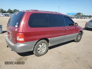 2003 Kia Sedona LX with VIN KNDUP131236411909, listed as a Copart auction lot 73715384 with 179,642 mi miles and Salvage Title. Bid and sale history available at carsss.com. Image 3.