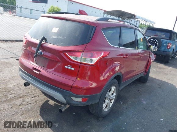 2013 Ford Escape SE with VIN 1FMCU0G98DUD09182, listed as a IAAI auction lot 42103807 with 204,293 mi miles and . Bid and sale history available at DreamBid. Image 4.