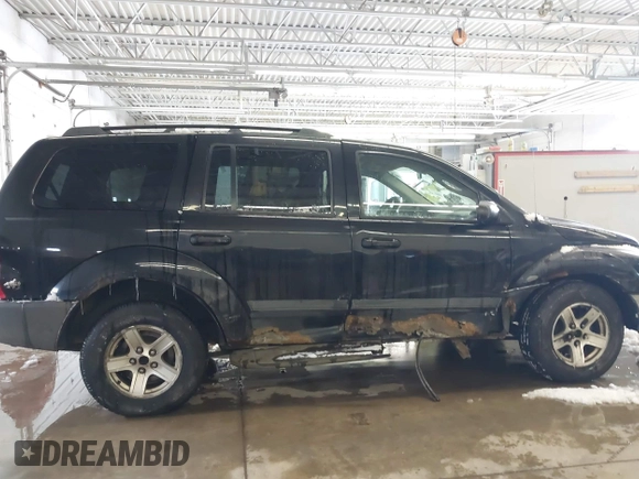 2005 Dodge Durango SXT with VIN 1D4HB38N15F610902, listed as a IAAI auction lot 41599584 with 175,661 mi miles and . Bid and sale history available at DreamBid. Image 6.