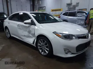 2014 Toyota Avalon Limited with VIN 4T1BK1EB6EU100635, listed as a IAAI auction lot 41609581 with 128,609 mi miles. Bid and sale history available at carsss.com. Image 1.