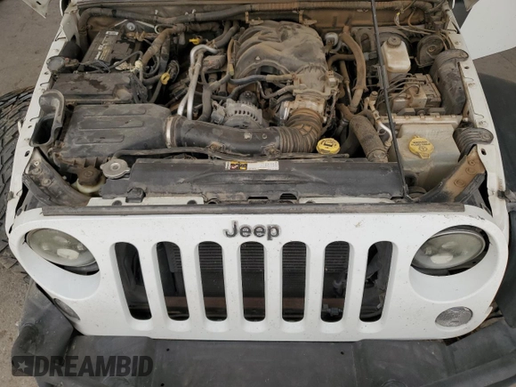 2013 Jeep Wrangler Unlimited Sport z VIN 1C4BJWDG8DL513680, wystawiony jako Copart lot #53805485 z przebiegiem 135 676 mil mil oraz Szkoda całkowita • Salvage title. Historia ofert i sprzedaży dostępna na DreamBid. Obrazek 12.