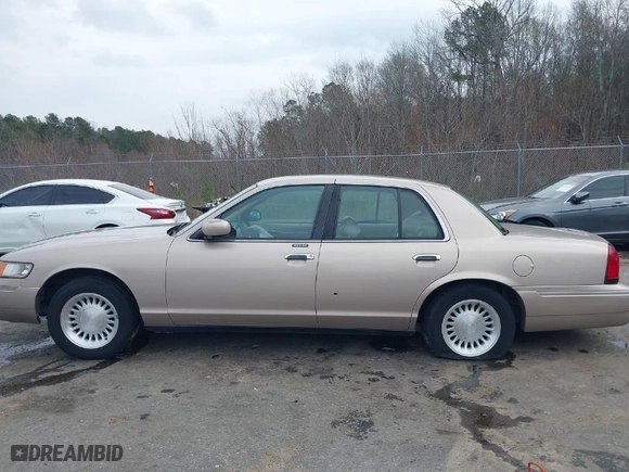 1998 Mercury Grand Marquis LS with VIN 2MEFM75W2WX695255, listed as a IAAI auction lot 41481865 with 177,365 mi miles. Bid and sale history available at carsss.com. Image 14.