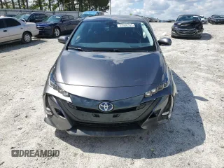 2021 Toyota Prius LE with VIN JTDKAMFP6M3190117, listed as a Copart auction lot 52938355 with 39,569 mi miles and Salvage title. Bid and sale history available at DreamBid. Image 5.