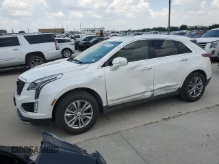 2021 Cadillac XT5 FWD Premium Luxury z VIN 1GYKNCR49MZ124233, wystawiony jako Copart lot #58157844 z przebiegiem 56 650 mil mil oraz Szkoda całkowita • Salvage title. Historia ofert i sprzedaży dostępna na DreamBid. Obrazek 1.
