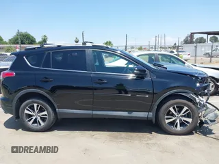 2018 Toyota RAV4 XLE with VIN 2T3WFREV2JW447623, listed as a IAAI auction lot 42410168 with 84,800 mi miles and . Bid and sale history available at DreamBid. Image 13.