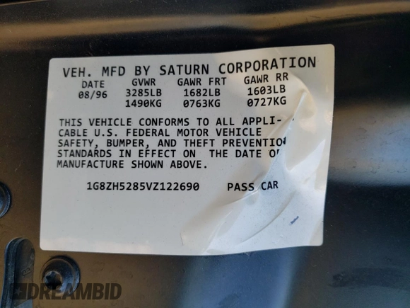 1997 Saturn SL z VIN 1G8ZH5285VZ122690, wystawiony jako Copart lot #81655244 z przebiegiem 159 048 mil mil oraz Szkoda całkowita • Salvage title. Historia ofert i sprzedaży dostępna na DreamBid. Obrazek 14.