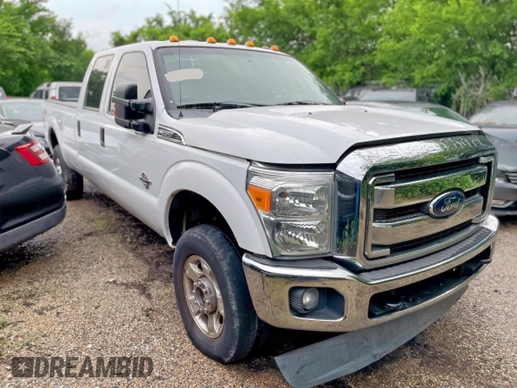 2014 Ford F-350 XLT z VIN 1FT8W3BT3EEB40662, wystawiony jako Copart lot #57728255 z przebiegiem 234 020 mil mil oraz Czysty tytuł • Clean title. Historia ofert i sprzedaży dostępna na DreamBid. Obrazek 1.