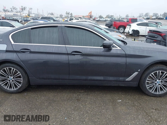 2019 BMW 5 Series 530e iPerformance with VIN WBAJA9C53KB399794, listed as a IAAI auction lot 41561874 with Not Provided miles. Bid and sale history available at carsss.com. Image 13.