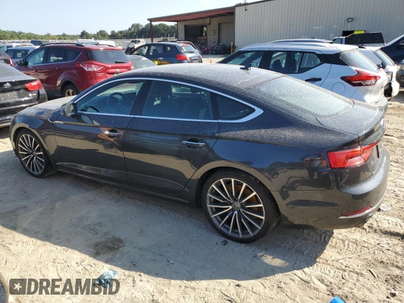 2018 Audi A5 Sportback Prestige with VIN WAUCNCF52JA008984, listed as a Copart auction lot 63944373 with 104,793 mi miles. Bid and sale history available at carsss.com. Image 2.