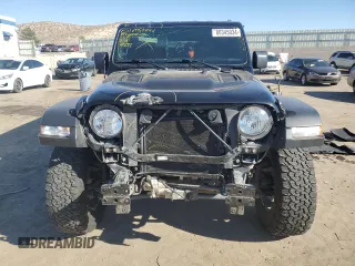 2022 Jeep Wrangler Unlimited Rubicon with VIN 1C4JJXFM6NW175930, listed as a Copart auction lot 80345034 with 27,265 mi miles and Salvage title. Bid and sale history available at DreamBid. Image 5.