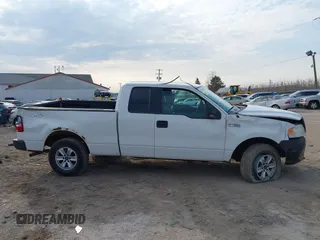 2005 Ford F-150 STX with VIN 1FTRX14W85FB72787, listed as a IAAI auction lot 41702370 with 210,544 mi miles. Bid and sale history available at carsss.com. Image 13.