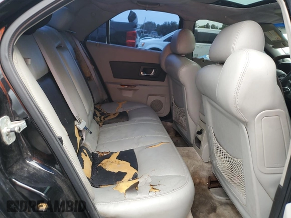 2004 Cadillac CTS with VIN 1G6DM577X40105370, listed as a Copart auction lot 58203715 with 135,391 mi miles and Salvage title. Bid and sale history available at DreamBid. Image 10.
