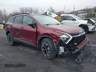 2023 Kia Sportage Plug-In Hybrid X-Line with VIN KNDPYDAH4P7026735, listed as a IAAI auction lot 42006354 with 24,004 mi miles. Bid and sale history available at carsss.com. Image 1.