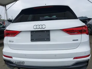 2021 Audi Q3 S line Premium z VIN WA1DECF31M1074155, wystawiony jako IAAI lot #42381678 z przebiegiem 36 894 mil mil oraz . Historia ofert i sprzedaży dostępna na DreamBid. Obrazek 17.