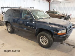 1999 Dodge Durango z VIN 1B4HS28Y1XF700830, wystawiony jako IAAI lot #42372223 z przebiegiem 247 159 mil mil oraz . Historia ofert i sprzedaży dostępna na DreamBid. Obrazek 1.