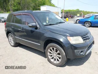 2013 Suzuki Grand Vitara Limited z VIN JS3TD0D7XD4100356, wystawiony jako IAAI lot #42250142 z przebiegiem 124 912 mil mil oraz . Historia ofert i sprzedaży dostępna na DreamBid. Obrazek 1.