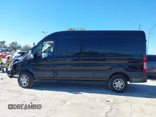 2016 Ford Transit Cargo z VIN 1FTYR2CM6GKB54374, wystawiony jako IAAI lot #41674672 z przebiegiem 128 594 mil mil oraz . Historia ofert i sprzedaży dostępna na DreamBid. Obrazek 15.