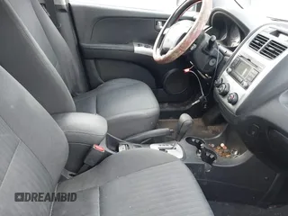 2009 Kia Sportage LX with VIN KNDJF723X97613377, listed as a IAAI auction lot 41454472 with 167,790 mi miles. Bid and sale history available at carsss.com. Image 5.