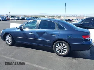 2007 Hyundai Azera SE z VIN KMHFC46F77A153141, wystawiony jako IAAI lot #41731777 z przebiegiem Nie podano mil oraz . Historia ofert i sprzedaży dostępna na DreamBid. Obrazek 12.