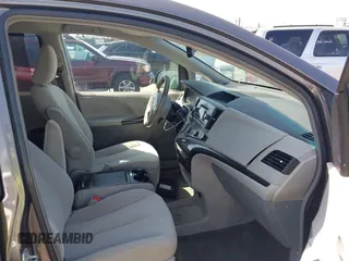 2012 Toyota Sienna LE AAS with VIN 5TDKK3DC9CS184722, listed as a IAAI auction lot 41942991 with 227,783 mi miles. Bid and sale history available at carsss.com. Image 5.