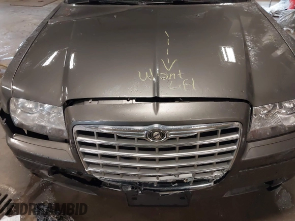 2010 Chrysler 300 Touring with VIN 2C3CA5CV9AH101800, listed as a IAAI auction lot 42015640 with 128,457 mi miles and . Bid and sale history available at DreamBid. Image 10.