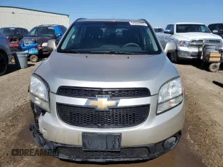 2012 Chevrolet Orlando 1LT z VIN KL77P2EM4CK576746, wystawiony jako Copart lot #54950285 z przebiegiem 183 399 mil mil oraz Szkody całkowita. Historia ofert i sprzedaży dostępna na DreamBid. Obrazek 5.