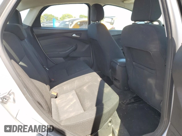 2018 Ford Focus SE with VIN 1FADP3F25JL324753, listed as a Copart auction lot 58624995 with 129,127 mi miles and Salvage title. Bid and sale history available at DreamBid. Image 10.