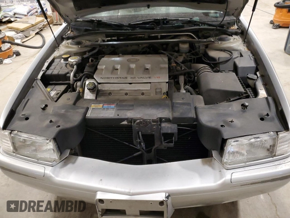 2000 Cadillac Eldorado Touring ETC z VIN 1G6ET1294YU180525, wystawiony jako Copart lot #89253455 z przebiegiem 102 230 mil mil oraz Nie do naprawy • Non repairable. Historia ofert i sprzedaży dostępna na DreamBid. Obrazek 12.