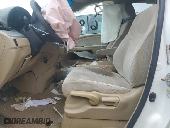 2010 Honda Odyssey LX with VIN 5FNRL3H23AB032112, listed as a Copart auction lot 60876035 with 223,335 mi miles and Salvage title. Bid and sale history available at DreamBid. Image 7.
