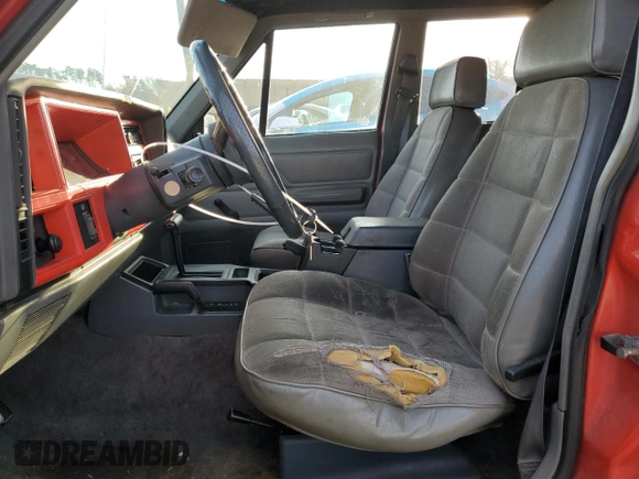 1994 Jeep Cherokee Sport with VIN 1J4FJ68S3RL239208, listed as a Copart auction lot 79121184 with 226,579 mi miles and Salvage title. Bid and sale history available at DreamBid. Image 7.