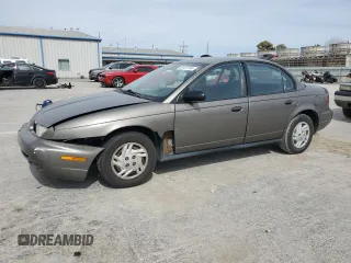 1998 Saturn SL z VIN 1G8ZH5285WZ232379, wystawiony jako Copart lot #48181765 z przebiegiem 114 512 mil mil oraz Szkoda całkowita • Salvage title. Historia ofert i sprzedaży dostępna na DreamBid. Obrazek 1.