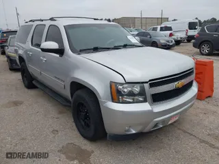2013 Chevrolet Suburban LT with VIN 1GNSCJE05DR174959, listed as a IAAI auction lot 41614856 with 205,995 mi miles. Bid and sale history available at carsss.com. Image 1.