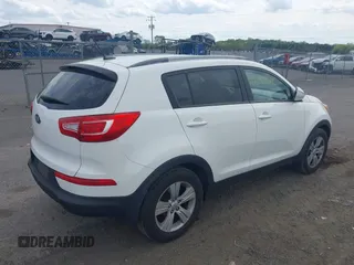 2013 Kia Sportage LX with VIN KNDPB3A20D7499468, listed as a IAAI auction lot 42090424 with 241,104 mi miles. Bid and sale history available at carsss.com. Image 4.