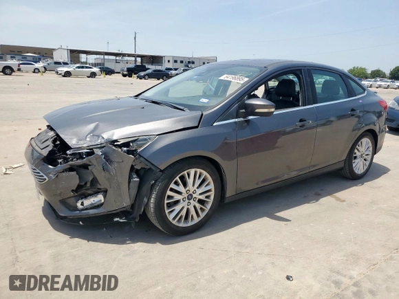 2017 Ford Focus Titanium with VIN 1FADP3J20HL253446, listed as a Copart auction lot 64196895 with 150,633 mi miles and Salvage title. Bid and sale history available at DreamBid. Image 1.