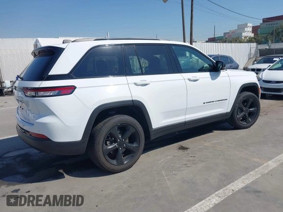 2023 Jeep Grand Cherokee Laredo with VIN 1C4RJHAGXPC660392, listed as a IAAI auction lot 41845564 with 7,444 mi miles and . Bid and sale history available at DreamBid. Image 4.