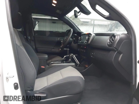2022 Toyota Tacoma SR with VIN 3TMCZ5AN5NM480311, listed as a IAAI auction lot 42542600 with 43,297 mi miles and . Bid and sale history available at DreamBid. Image 5.