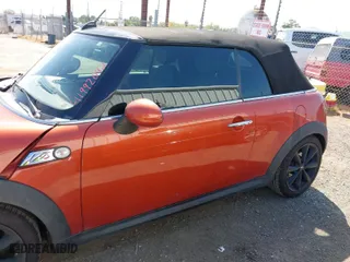 2013 MINI Cooper Convertible S with VIN WMWZP3C51DT705547, listed as a IAAI auction lot 41992042 with 94,912 mi miles. Bid and sale history available at carsss.com. Image 15.