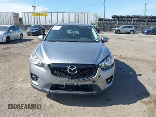 2014 Mazda CX-5 Grand Touring with VIN JM3KE4DY7E0311893, listed as a IAAI auction lot 42090872 with 102,154 mi miles and . Bid and sale history available at DreamBid. Image 12.