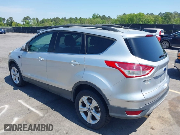 2013 Ford Escape SE with VIN 1FMCU0GX0DUA19811, listed as a IAAI auction lot 42009015 with 135,662 mi miles. Bid and sale history available at carsss.com. Image 3.