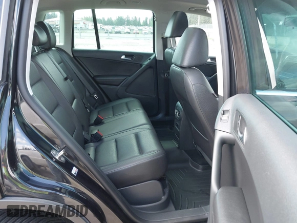 2012 Volkswagen Tiguan SE with VIN WVGBV7AX5CW561368, listed as a IAAI auction lot 42197389 with 63,809 mi miles and . Bid and sale history available at DreamBid. Image 8.