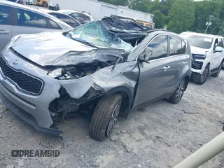 2019 Kia Sportage EX with VIN KNDPN3AC5K7591849, listed as a IAAI auction lot 42166917 with 50,984 mi miles and . Bid and sale history available at DreamBid. Image 17.