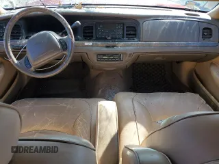 1998 Ford Crown Victoria LX с VIN 2FAFP74W4WX118422, выставлен на аукционе Copart как лот 78716184 с пробегом 70 214 миль миль и Списание • Salvage title. История ставок и продаж доступна на DreamBid. Изображение 8.