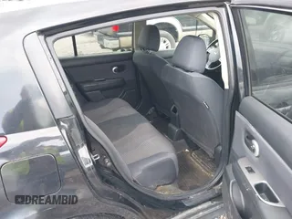 2009 Nissan Versa 1.8 S with VIN 3N1BC13E79L354341, listed as a IAAI auction lot 42079896 with 118,797 mi miles. Bid and sale history available at carsss.com. Image 8.