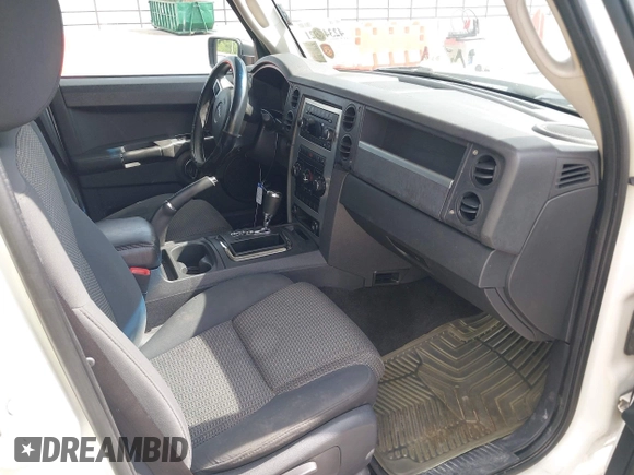 2010 Jeep Commander Sport z VIN 1J4RH4GK4AC140982, wystawiony jako IAAI lot #42344821 z przebiegiem 179 476 mil mil oraz . Historia ofert i sprzedaży dostępna na DreamBid. Obrazek 5.