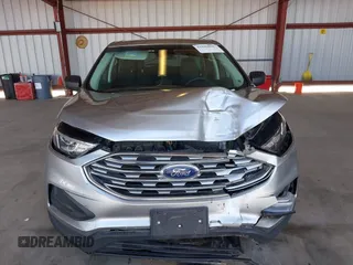 2020 Ford Edge SE z VIN 2FMPK3G97LBA60726, wystawiony jako IAAI lot #41996884 z przebiegiem 62 817 mil mil oraz . Historia ofert i sprzedaży dostępna na DreamBid. Obrazek 12.