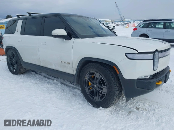 2023 Rivian R1S Adventure z VIN 7PDSGABA9PN015327, wystawiony jako IAAI lot #41484133 z przebiegiem Nie podano mil oraz . Historia ofert i sprzedaży dostępna na DreamBid. Obrazek 1.