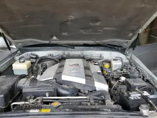 2001 Lexus LX 470 z VIN JTJHT00W113505721, wystawiony jako Copart lot #56463665 z przebiegiem 223 553 mil mil oraz Szkody całkowita. Historia ofert i sprzedaży dostępna na DreamBid. Obrazek 12.