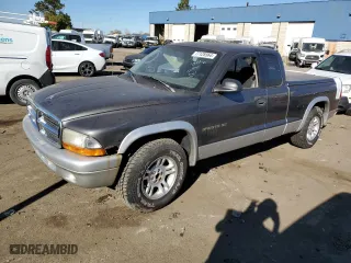 2002 Dodge Dakota SLT with VIN 1B7GL42X72S584170, listed as a Copart auction lot 77125564 with 0 mi miles and Salvage Title. Bid and sale history available at carsss.com. Image 1.